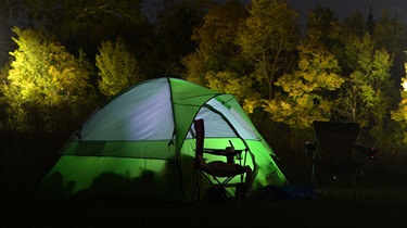 Tent lit from within at night