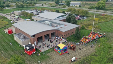 Bird's eye view of fire station with inflatable bounce houses