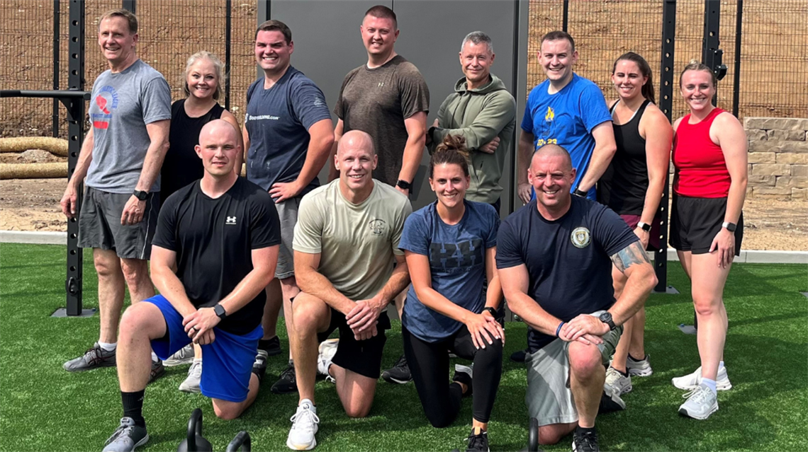 Group of 12 people who participated in Work Out with Lenexa Police. 