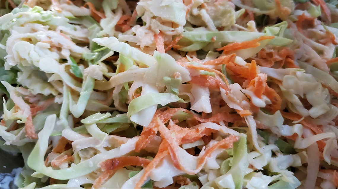 closeup view of coleslaw with cabbage and carrots