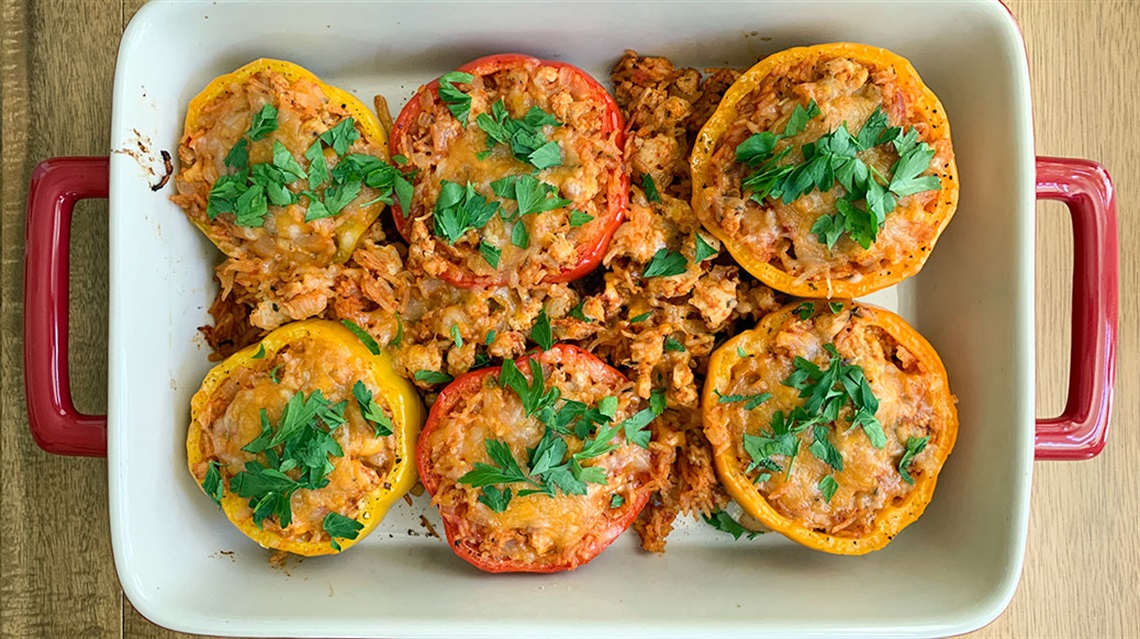 aerial view of stuffed bell peppers in a baking dish