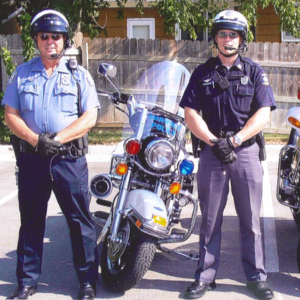 Dave Little and his dad, Sam, in their police officer uniforms