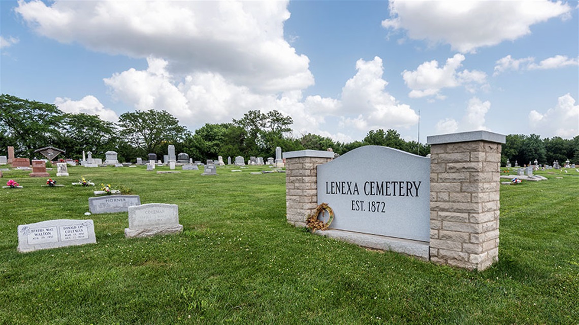 Lenexa Cemetery sign and gravestones