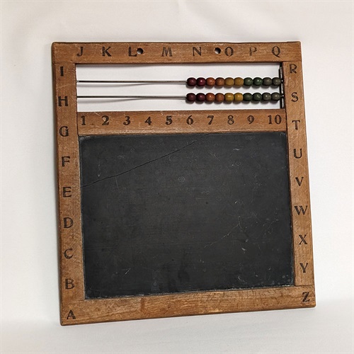 19th-century school slate with abacus